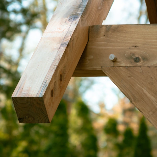 Cedar bracket with truss on top
