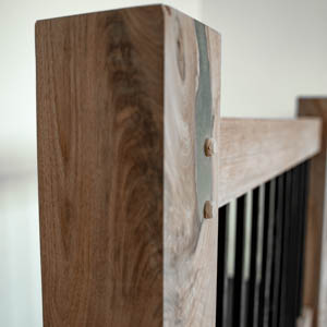 timber framed walnut handrail post