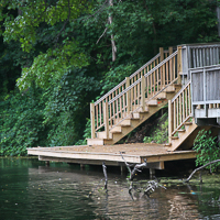 boat dock with two stairways
