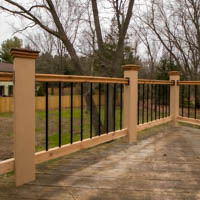 cedar deck railing with black spindles and composit posts